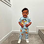 Jeremiyahh joined the competition — help win amazing prizes! toddler, child, smile, pajamas, cartoon, indoor, carpet, white_wall, stairs, shoes, happy, standing, person, cute, short_hair, light_switch, home, clothing, young_child, portrait