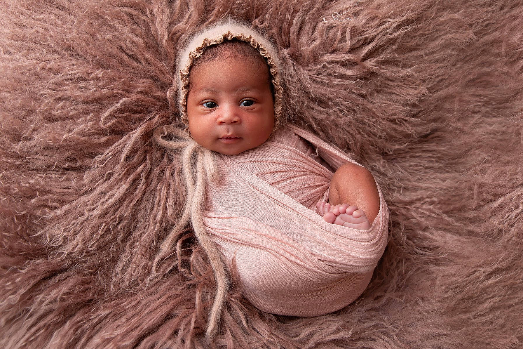 Janiyah is registered to the contest to win money with this photo: baby, beauty, brown, child, child_model, close_up, eye, face, fur, head, iris, lip, nose, person, photograph, photography, pink, skin, smile, textile