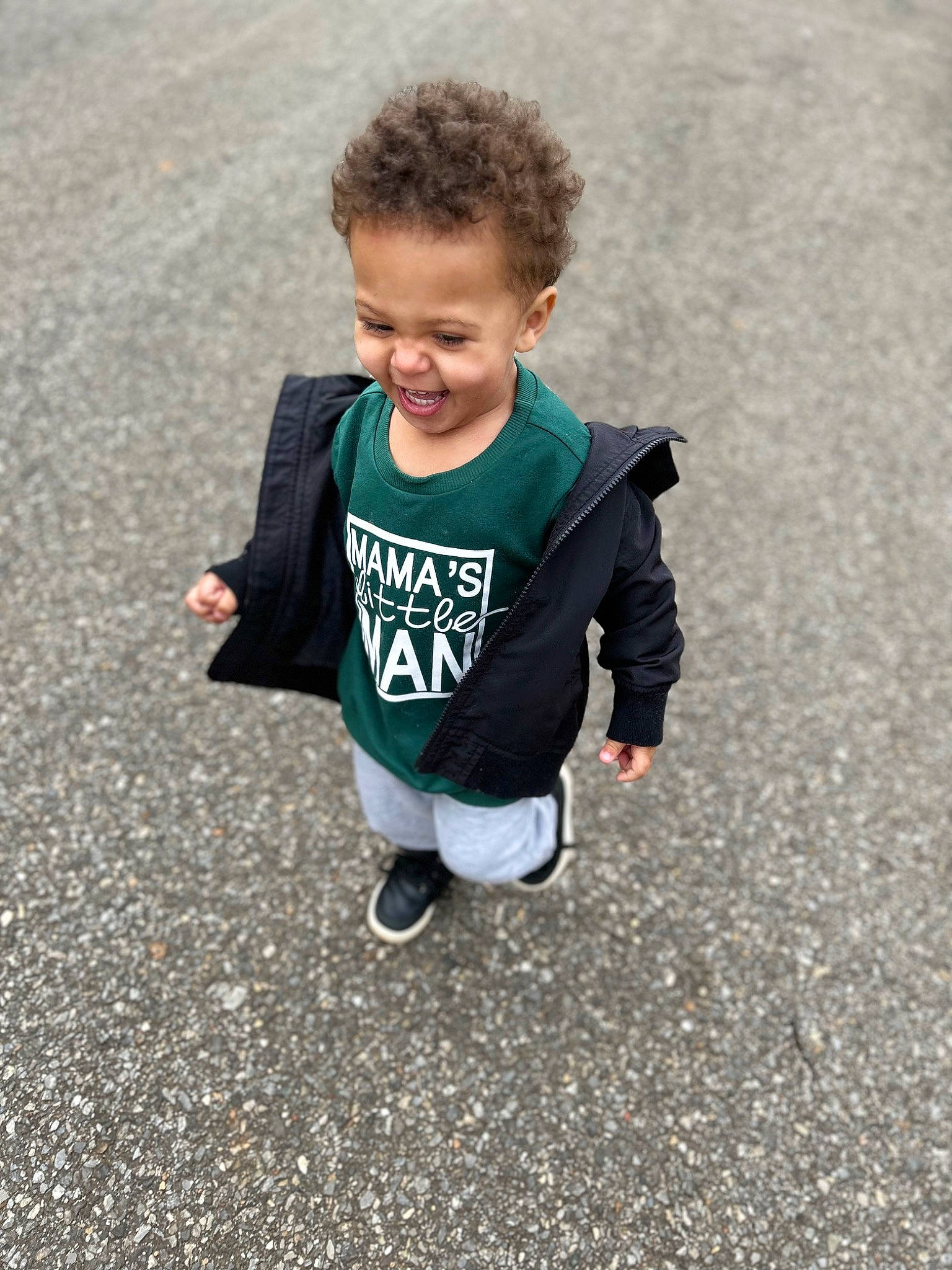 Malaki joined the competition — help win amazing prizes! asphalt, baby_toddler_clothing, child, eye, flooring, fun, grass, grey, happy, head, person, recreation, road_surface, shadow, sitting, sleeve, smile, soil, sportswear, t_shirt
