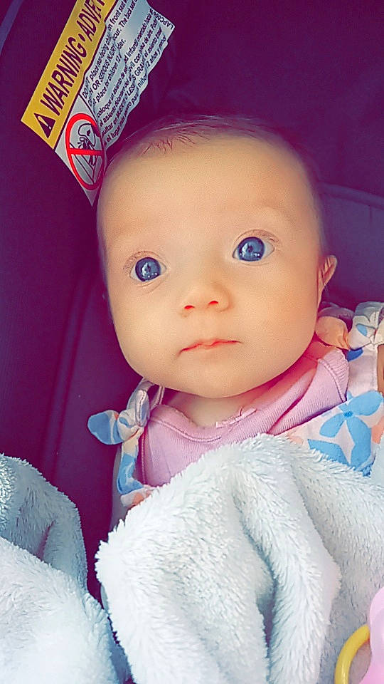 Allison is registered to the contest to win money with this photo: baby, baby_products, baby_toddler_clothing, cap, cheek, child, costume_hat, electric_blue, eyelash, fashion_accessory, fun, happy, magenta, nose, pattern, person, pink, product, skin, sleeve