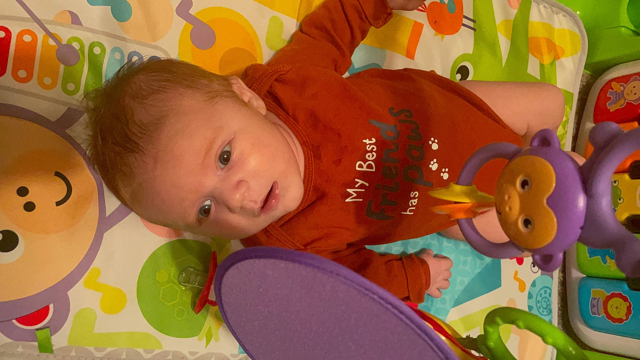 Bryson is registered to the contest to win money with this photo: baby, baby_products, baby_toddler_clothing, baby_toys, beauty, cheek, child, facial_expression, flooring, fun, happy, mammal, orange, people, person, play, product, room, textile, toddler