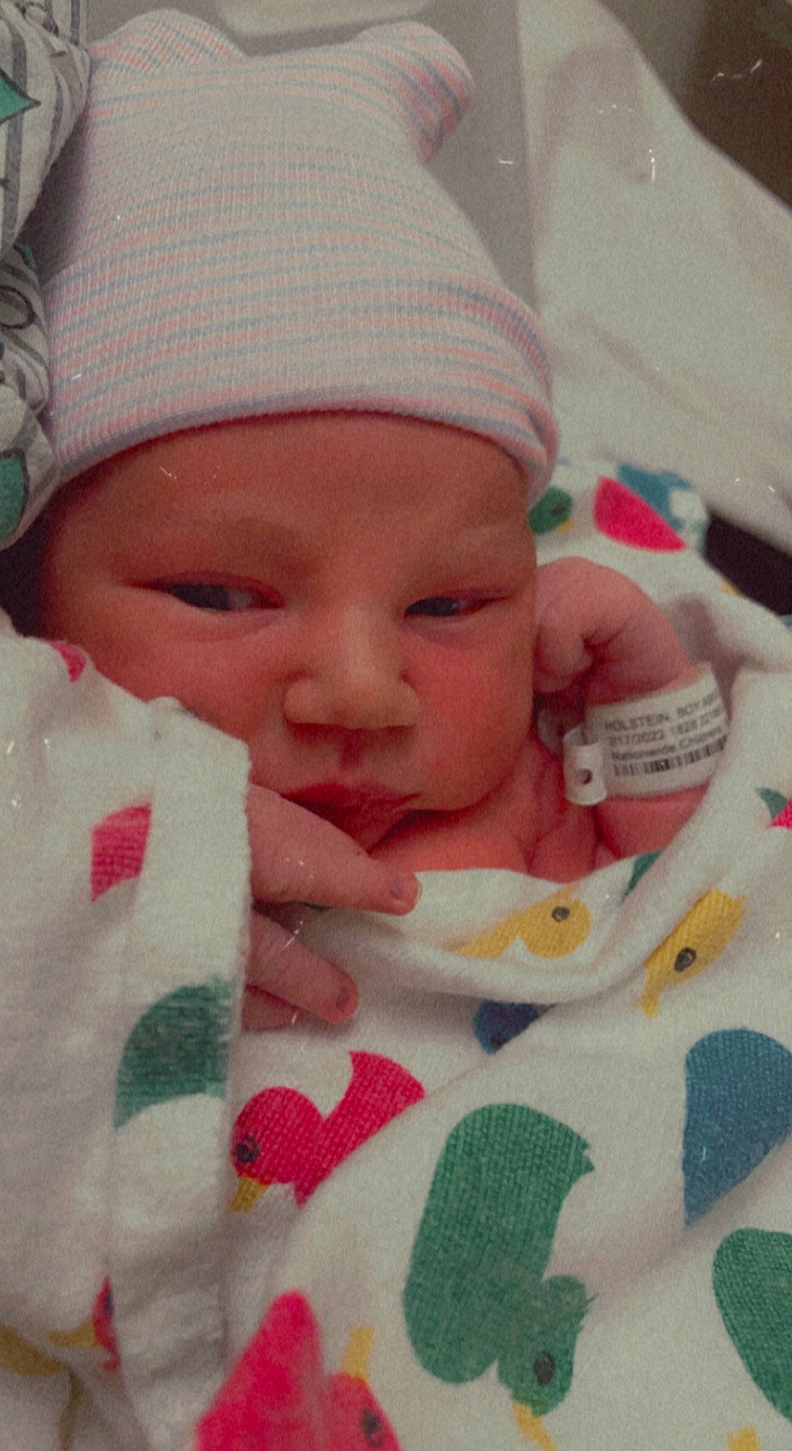 Bryson joined the competition — help win amazing prizes! baby, baby_sleeping, baby_toddler_clothing, cap, cheek, chin, comfort, eye, face, hand, headgear, headwear, lip, nose, organ, person, pink, product, skin, textile