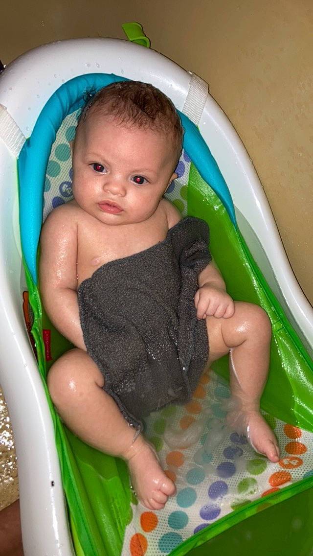 Lylah joined the competition — help win amazing prizes! baby, baby_bathing, baby_products, baby_toddler_clothing, bathing, bathtub, cheek, chest, child, finger, fun, head, iris, leisure, mouth, person, product, sitting, skin, thigh