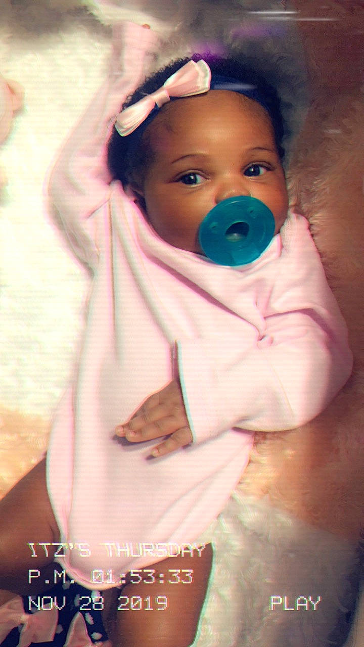 Amelia is registered to the contest to win money with this photo: baby, beauty, cheek, child, ear, eye, face, forehead, head, iris, lip, mouth, nose, person, photography, pink, skin, smile, toddler