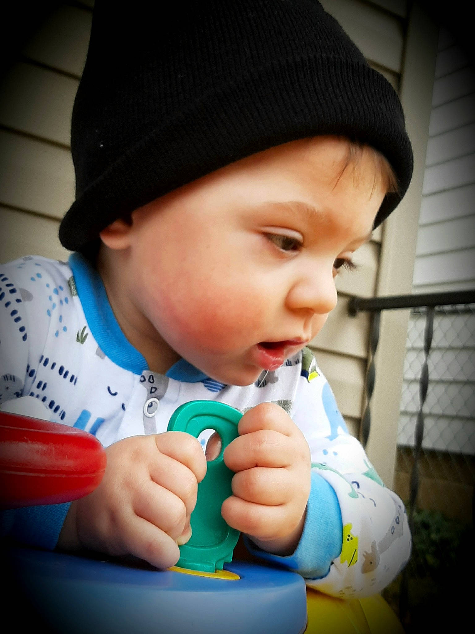 Forrest is registered to the contest to win money with this photo: baby, cap, cheek, child, headgear, nose, person, play, toddler