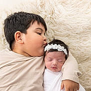 Andrew Matteo Romero is registered to the contest to win money with this photo: baby, boy, child, cute, floral_headband, gentle, infant, kissing, laying_down, love, newborn, peaceful, portrait, resting, soft_texture, tenderness, two_children, white_clothing, young_sibling, warmth