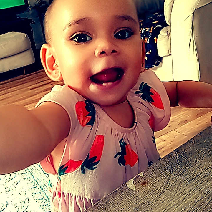 Centeria is registered to the contest to win money with this photo: architecture, baby, bodypart, building, couch, cushion, face, finger, furniture, hand, head, homedecor, indoors, interiordesign, livingroom, person, photography, portrait, room, sitting