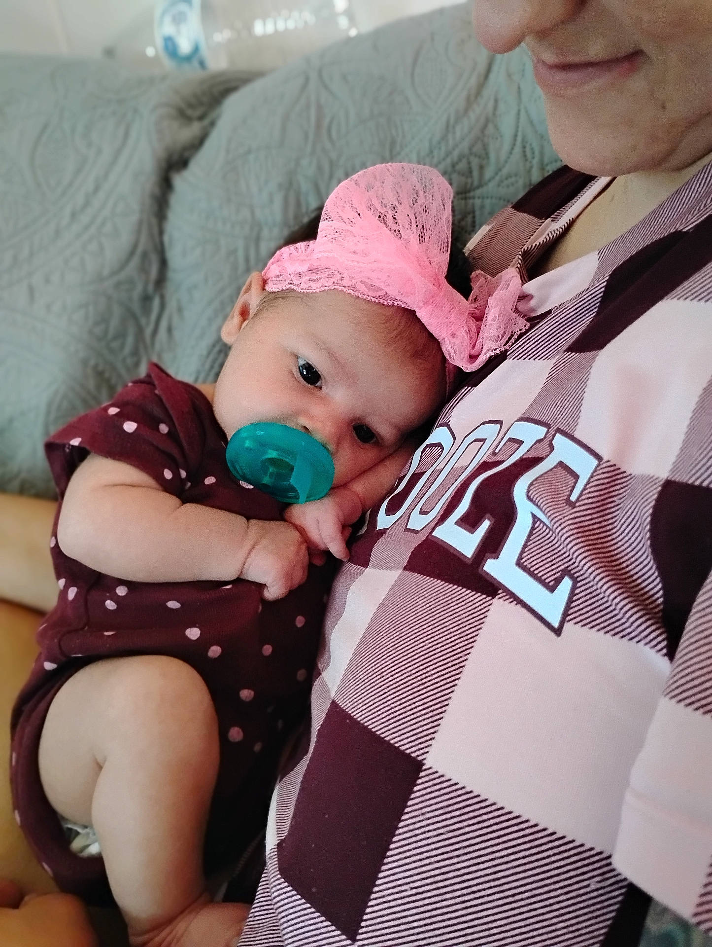 adult, baby, child, closeup, clothing, comfort, cozy, cute, fabric, headband, holding, indoor, love, pacifier, person, pink, portrait, resting, smile, toddler
