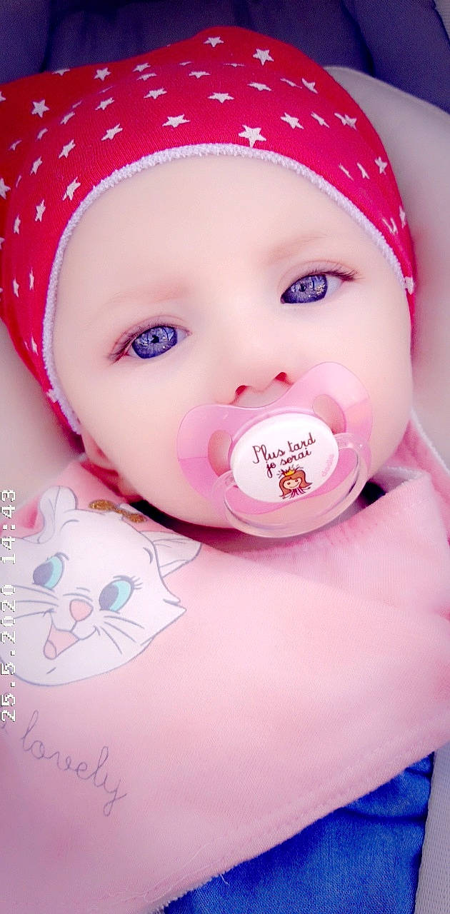 Heiana participe au concours pour gagner de l'argent avec cette photo : baby, cheek, child, eye, eyelash, face, forehead, head, headgear, headwear, lip, mouth, nose, person, photography, pink, skin, smile, sweetness, toddler