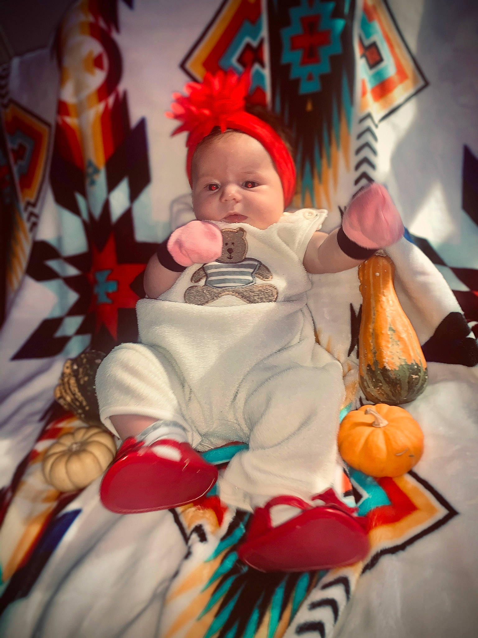 Persephone Rainn is registered to the contest to win money with this photo: baby, calabaza, child, entertainment, event, fictional_character, fun, gourd, holiday, lap, leisure, person, pumpkin, room, sitting, stuffed_toy, textile, toddler, toy, tradition