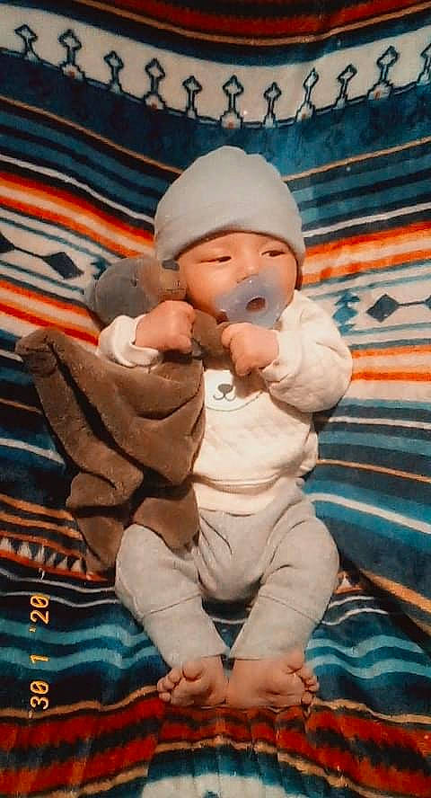 Koda joined the competition — help win amazing prizes! baby, baby_toddler_clothing, beanie, cap, cheek, child, fictional_character, freezing, fun, happy, headwear, leisure, person, recreation, sitting, toddler, vacation, winter, world