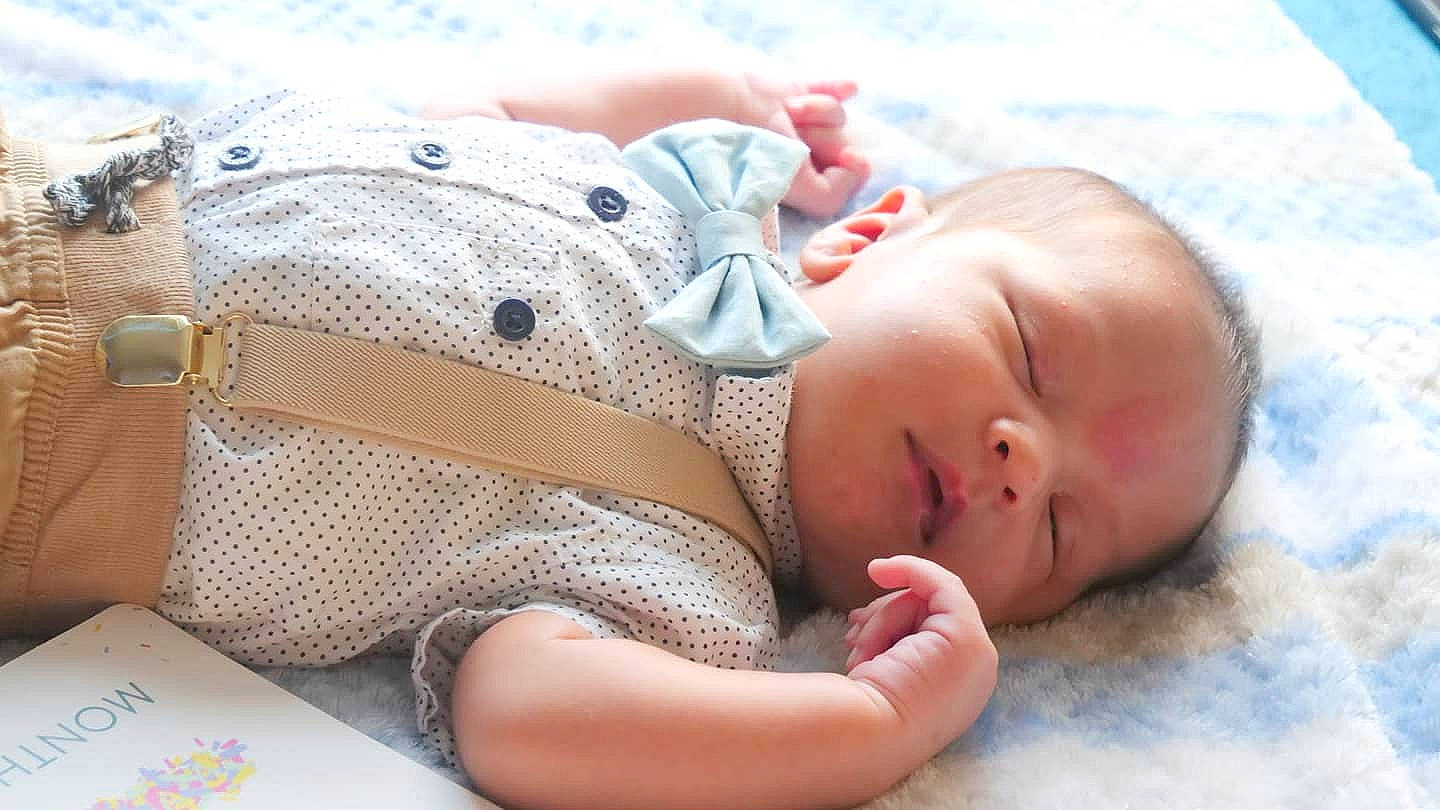 Byron joined the competition — help win amazing prizes! arm, baby, baby_sleeping, baby_toddler_clothing, child, comfort, face, finger, grass, happy, linens, mouth, pattern, people, person, product, skin, textile, toddler, toy