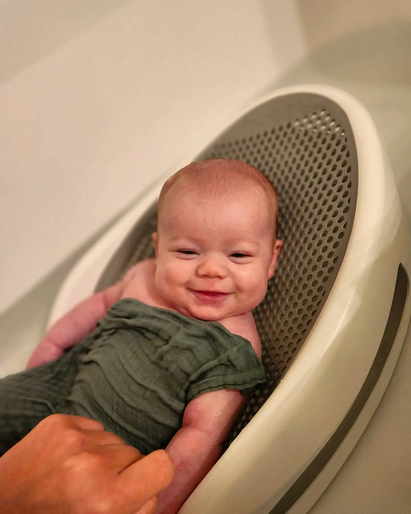 Violet is registered to the contest to win money with this photo: baby, baby_products, baby_toddler_clothing, child, circle, comfort, eye, finger, flooring, foot, gesture, hand, joy, leg, nail, person, sitting, skin, smile, thumb