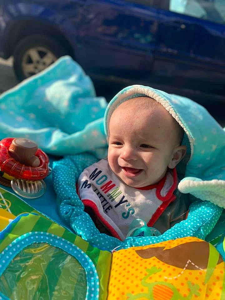 Mateo joined the competition — help win amazing prizes! baby, baby_products, baby_toddler_clothing, cap, child, comfort_food, event, fun, grass, happy, hat, leisure, mouth, person, personal_protective_equipment, photograph, play, recreation, sitting, smile