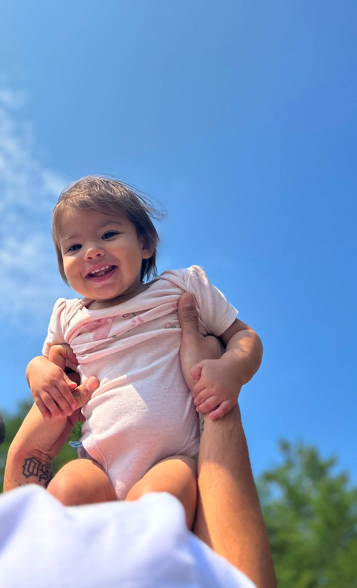 Creedance is registered to the contest to win money with this photo: azure, baby, baby_toddler_clothing, cloud, dress, finger, flash_photography, gesture, grass, happy, human_body, human_leg, leisure, people_in_nature, person, shorts, sky, smile, thigh, toddler