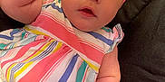 Aaliyah is registered to the contest to win money with this photo: baby, infant, child, pink_bow, headband, striped_dress, colorful_clothing, cute, chubby_cheeks, hand, face, eyes, lying_down, fabric, dark_background, portrait, skin, baby_fashion, cute_expression, child_portrait