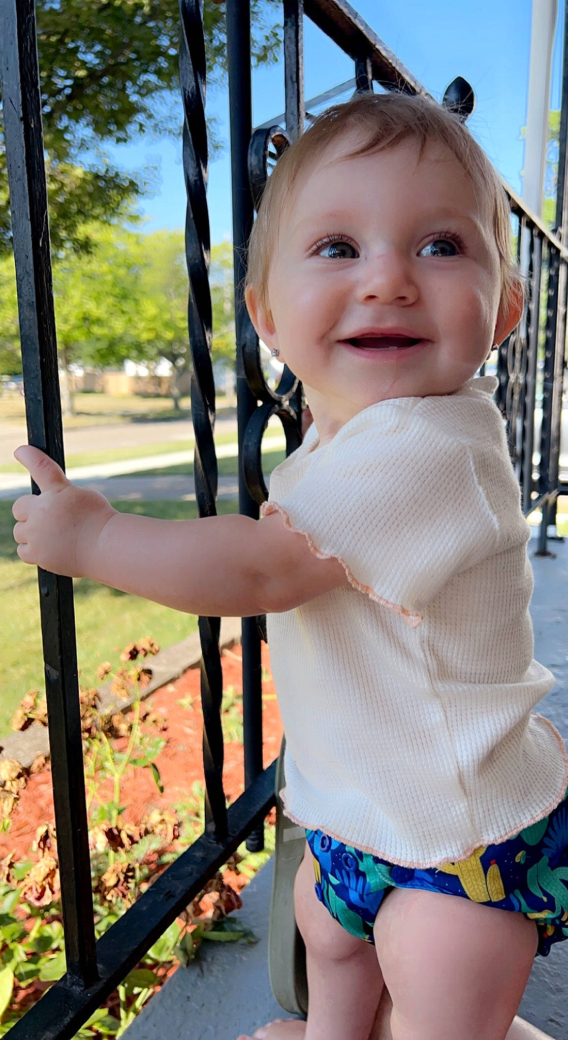 Caliegh joined the competition — help win amazing prizes! baby_toddler_clothing, blue, cheek, eye, hairstyle, happy, head, human, iris, joy, leaf, light, organ, people_in_nature, person, plant, shorts, skin, smile, standing