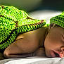 baby, newborn, sleeping, green, crochet, hat, blanket, turtle, infant, cute, soft, cushion, resting, peaceful, portrait, child, cozy, closeup, indoors, warm