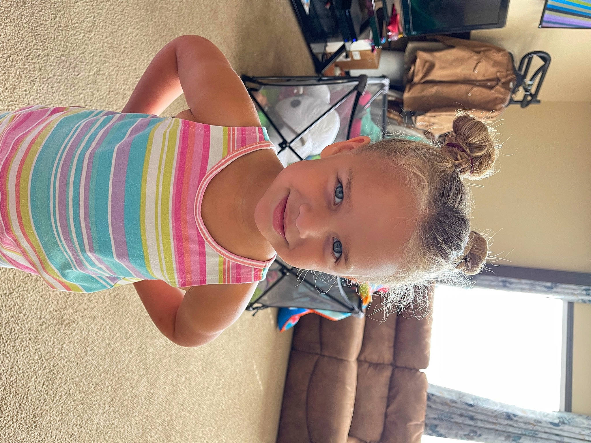 Kassidy is registered to the contest to win money with this photo: chest, child, dress, elbow, eyewear, finger, fun, glasses, happy, human_body, human_leg, joy, leisure, neck, person, skin, smile, sunglasses, thigh, toddler