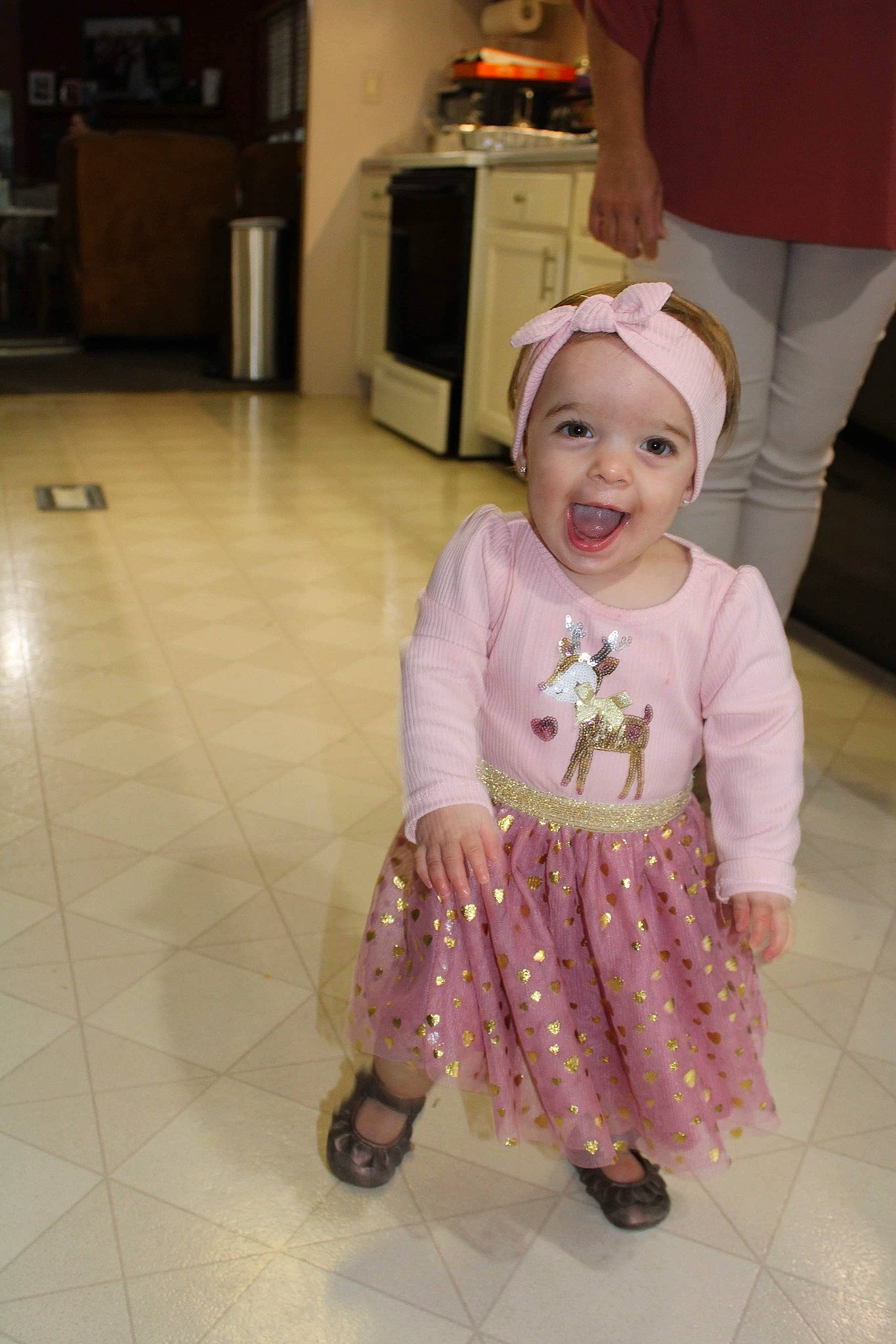 Demi joined the competition — help win amazing prizes! baby_toddler_clothing, cabinetry, clothing, floor, flooring, happy, headwear, home_appliance, joint, kitchen_appliance, leg, magenta, person, pink, purple, refrigerator, shoe, skin, sleeve, smile