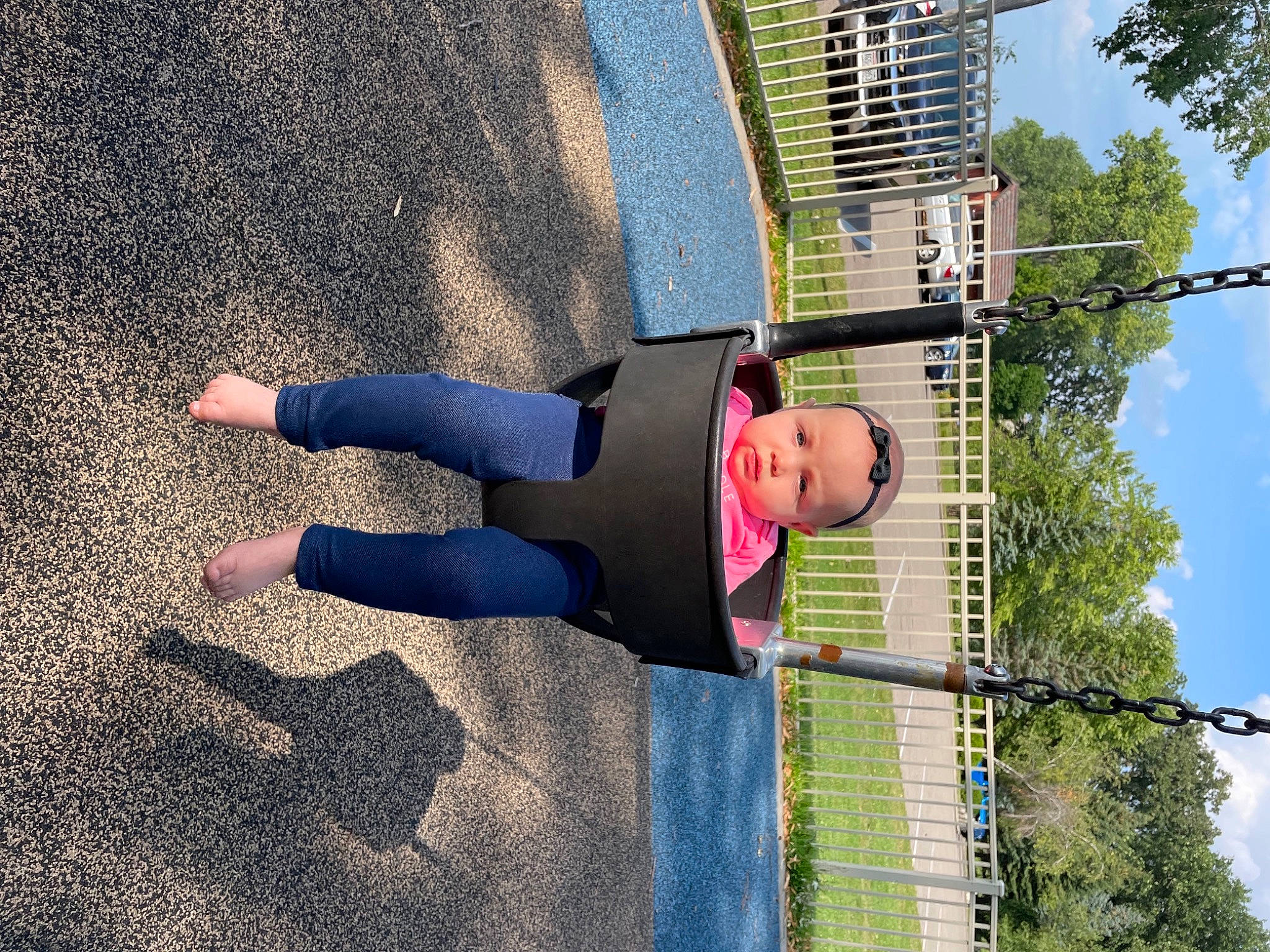 Kinsley joined the competition — help win amazing prizes! asphalt, building, city, electric_blue, electricity, fun, grass, headwear, human_leg, knee, leisure, nature, people_in_nature, person, public_utility, recreation, road_surface, sky, street_light, tower