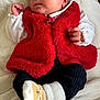 baby, newborn, sleeping, red_vest, white_shirt, black_pants, bear_socks, blanket, infant, cute, cozy, soft_texture, clothing, portrait, peaceful, hands, face, head, resting, indoor
