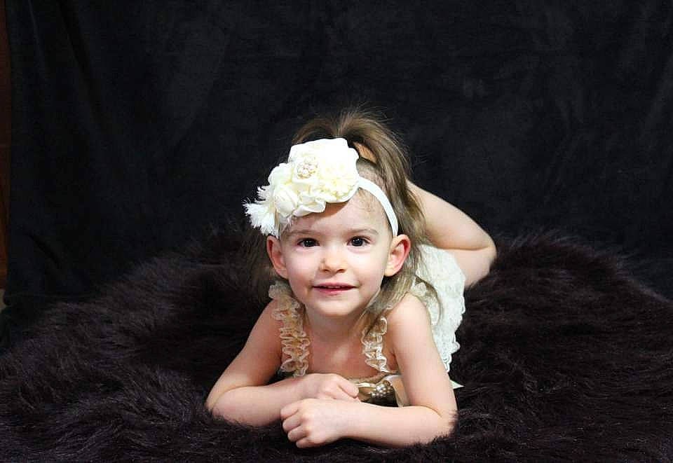 Ava Marie is registered to the contest to win money with this photo: baby, beauty, child, child_model, costume_accessory, dress, fashion_accessory, flash_photography, fur, hair, hair_accessory, hairstyle, headband, headgear, headpiece, headwear, person, photo_shoot, photography, portrait