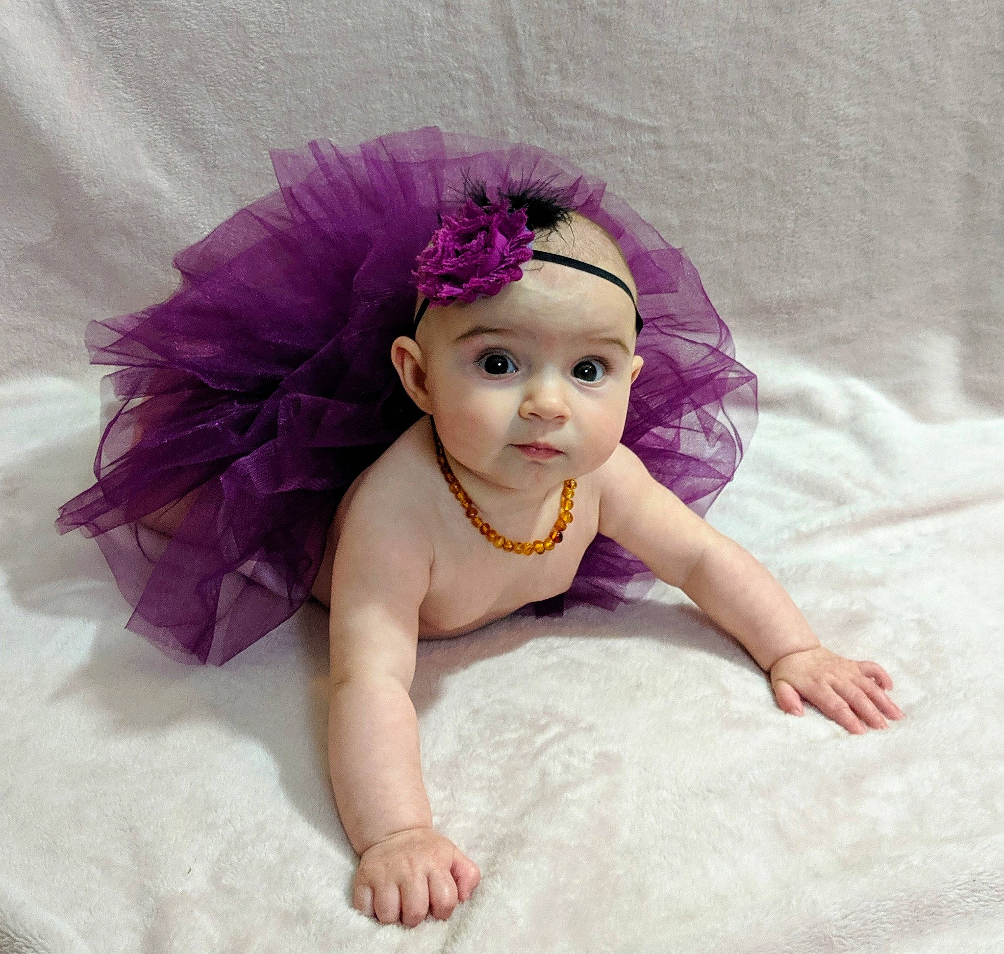 Lilah Reagan joined the competition — help win amazing prizes! baby, baby_bloomers, baby_products, baby_toddler_clothing, ballet_tutu, child, costume, costume_accessory, face, hair_accessory, head, headgear, headpiece, lilac, person, pink, product, purple, skin, toddler