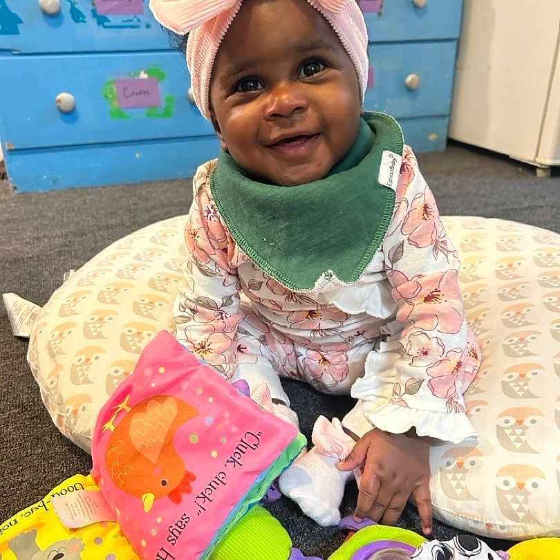Lyndii-Kate joined the competition — help win amazing prizes! baby, babylaughing, bed, cabinet, clothing, cushion, drawer, dress, face, furniture, happy, hat, head, homedecor, person, photography, portrait, quilt, sitting, smile