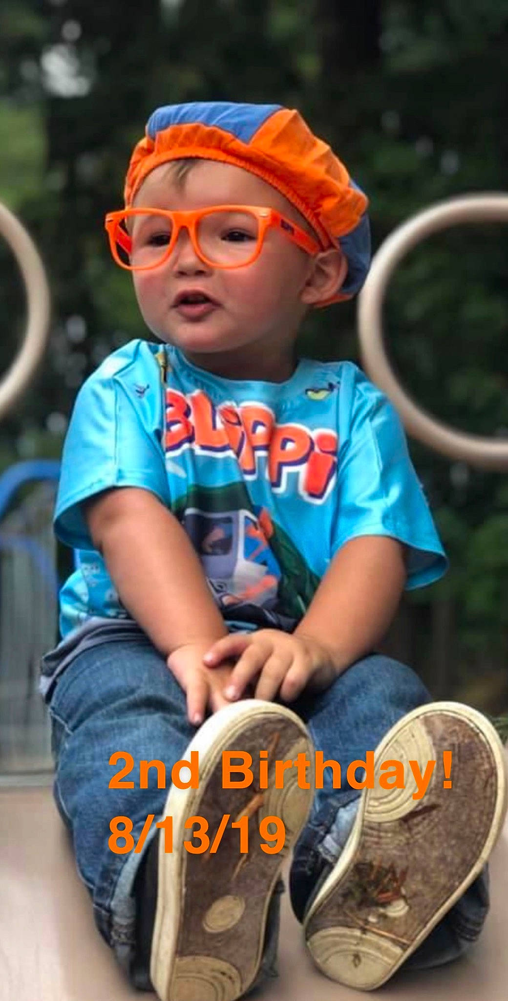 Bentley joined the competition — help win amazing prizes! arm, automotive_tire, baby_toddler_clothing, cap, cool, eyewear, face, facial_expression, fun, glasses, goggles, hairstyle, happy, head, headwear, jeans, orange, person, product, sunglasses