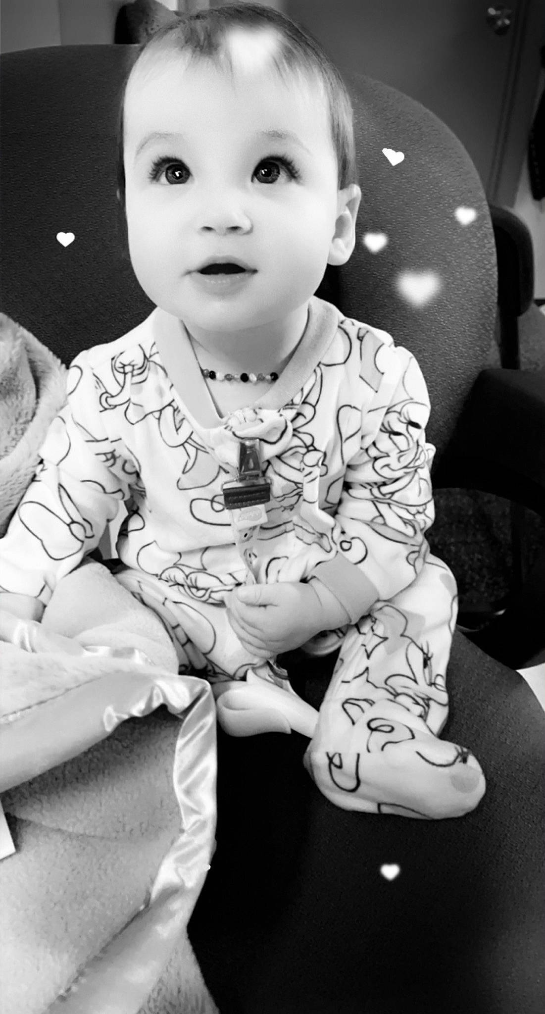 Estelle joined the competition — help win amazing prizes! armrest, baby, baby_products, baby_toddler_clothing, car_seat, cheek, child, head_restraint, living_room, long_sleeved_t_shirt, overall, person, sleeve, sock, toddler