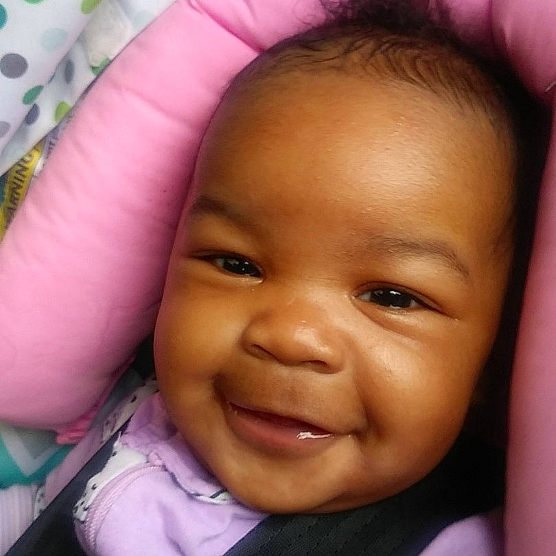 Nova-lynn is registered to the contest to win money with this photo: baby, beauty, cheek, child, chin, close_up, eye, eyebrow, face, facial_expression, forehead, hair, head, joy, lip, mouth, nose, person, pink, skin