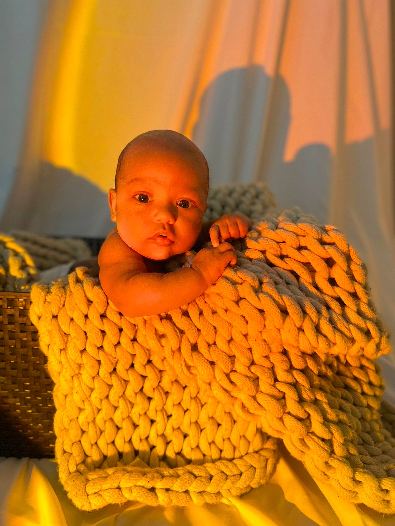 Drayson joined the competition — help win amazing prizes! baby, baby_products, baby_sleeping, baby_toddler_clothing, child, comfort, curtain, eye, flooring, linens, orange, pattern, peach, person, room, sitting, toddler, wood, wool, woolen