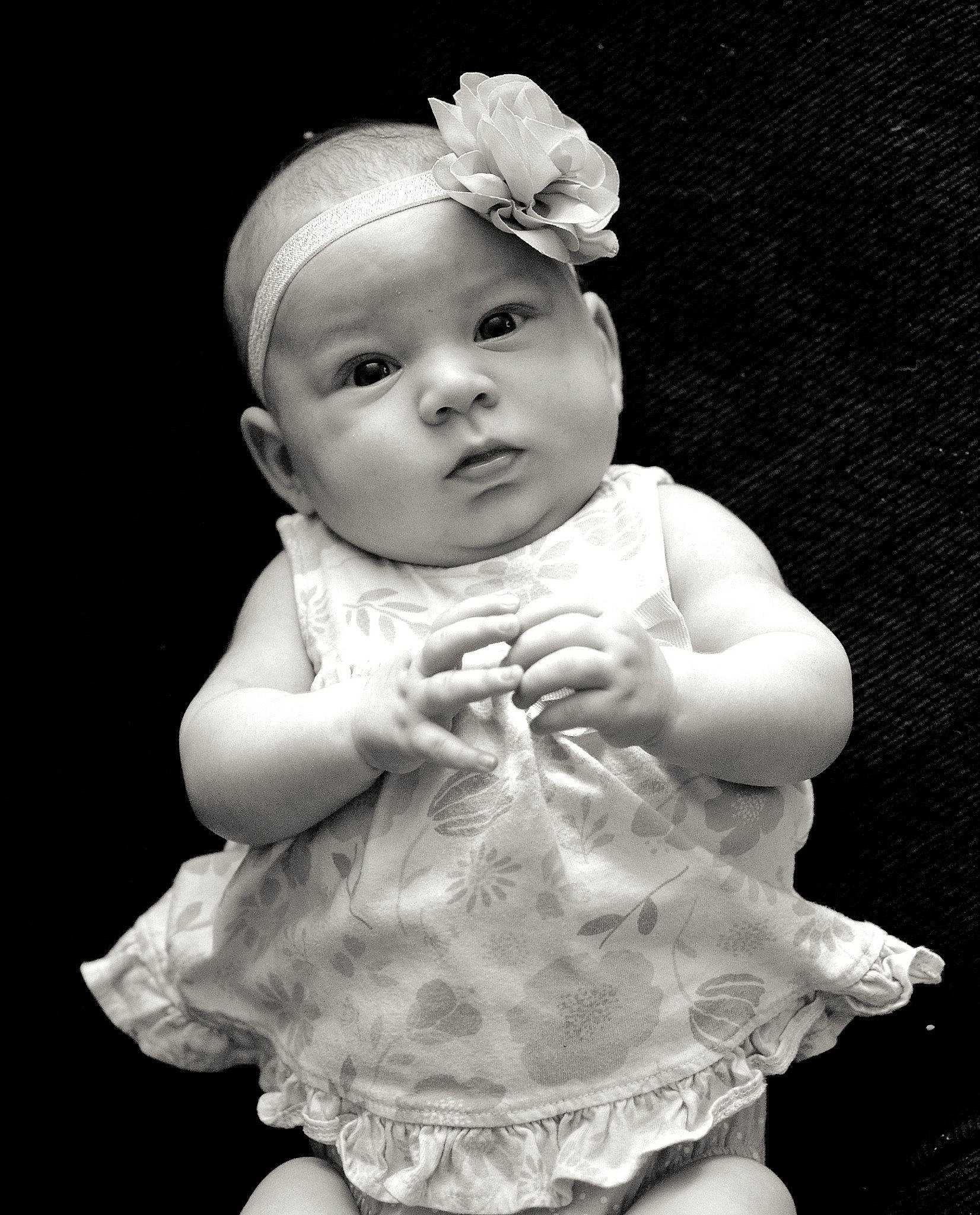 Kirra is registered to the contest to win money with this photo: arm, baby, baby_toddler_clothing, black, cap, cheek, chin, finger, flash_photography, gesture, hand, head, headgear, headwear, iris, person, photograph, pink, skin, sleeve