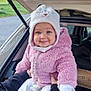 baby, child, smiling, pink_jacket, white_hat, car_trunk, outdoor, autumn, person, cute, blue_eyes, holding, clothing, pacifier, box, nature, trees, daylight, happy, warm_clothing