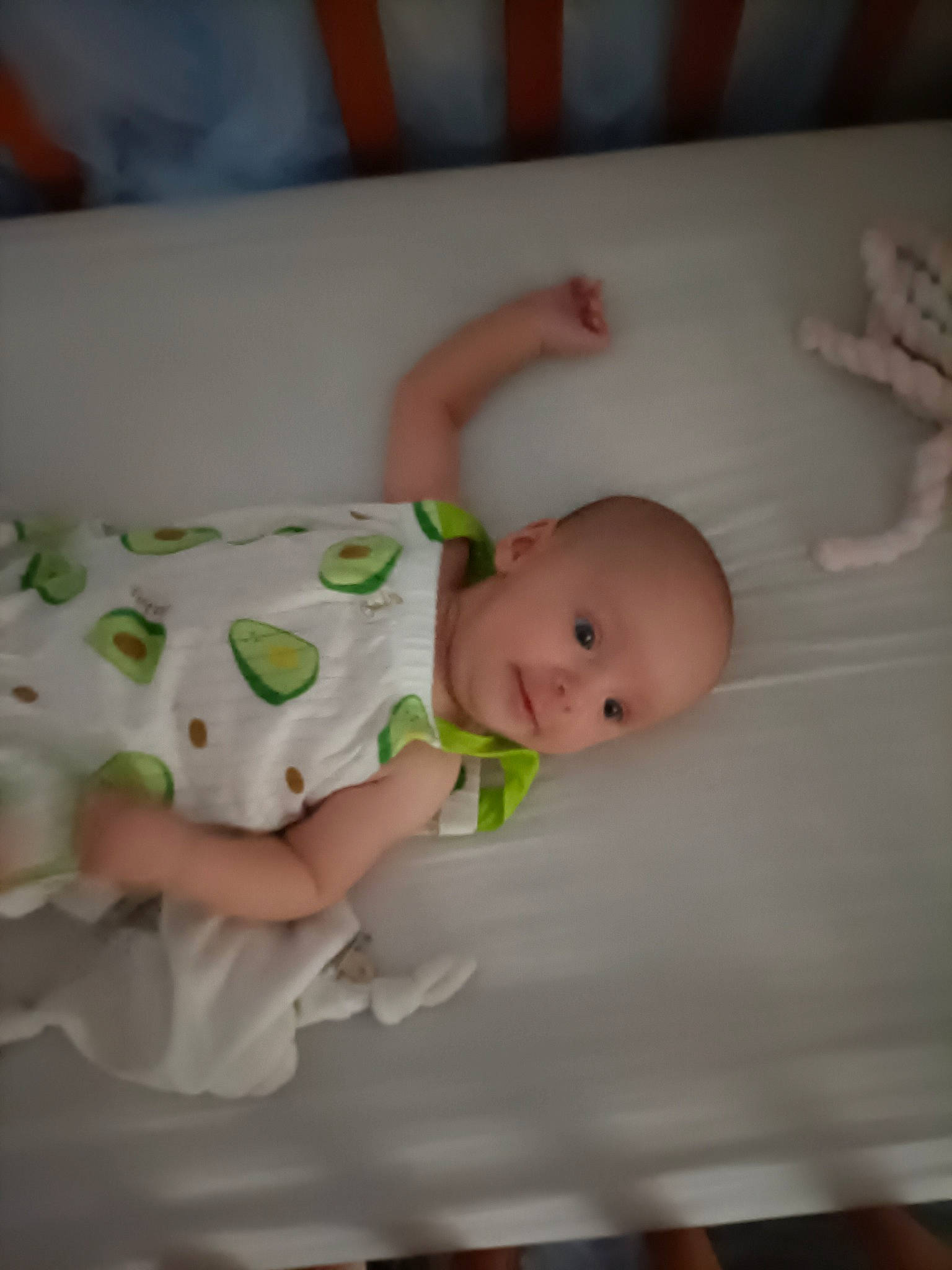 Stella participe au concours pour gagner de l'argent avec cette photo : baby, baby_products, baby_safety, baby_toddler_clothing, cheek, child, comfort, eye, face, hardwood, head, human_body, linens, pattern, person, room, sitting, sleeve, thumb, toddler