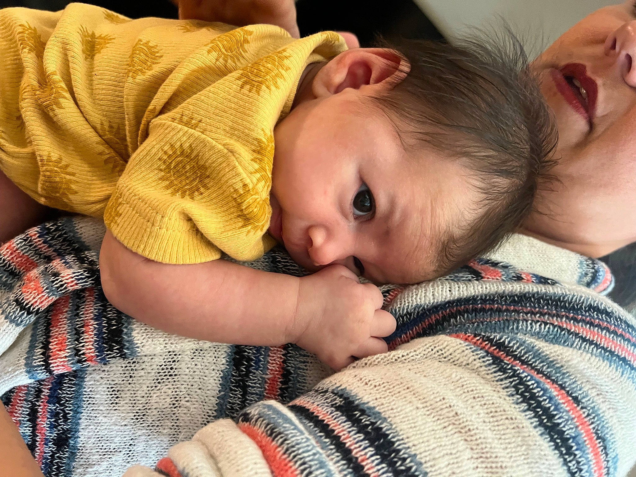 Moira is registered to the contest to win money with this photo: baby_toddler_clothing, cheek, chin, comfort, ear, eyebrow, eyelash, face, finger, gesture, happy, head, iris, lip, mouth, neck, nose, person, skin, textile