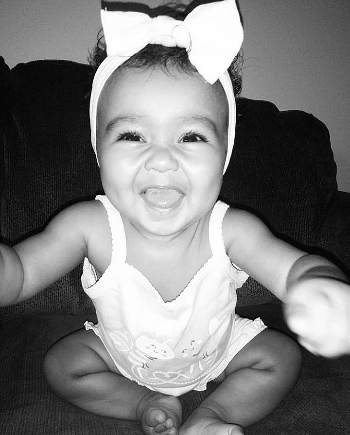 Izabelle is registered to the contest to win money with this photo: beauty, black, black_and_white, cheek, child, emotion, eye, face, facial_expression, head, infant, joy, monochrome_photography, nose, person, photograph, photography, sitting, skin, smile