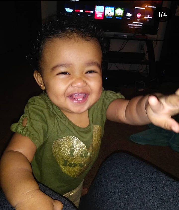 Izabelle is registered to the contest to win money with this photo: arm, black_hair, cheek, child, chin, cool, day, face, finger, fun, girl, hand, head, human_body, joy, mouth, organ, person, product, skin