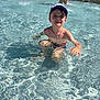 Jules a rejoint le concours — aidez-le/la à gagner de superbes lots ! adult, boy, cap, chair, child, daylight, fun, necklace, outdoor, person, playing, poolside, recreation, splash, summer, sunlight, swimming_pool, swimsuit, vacation, water