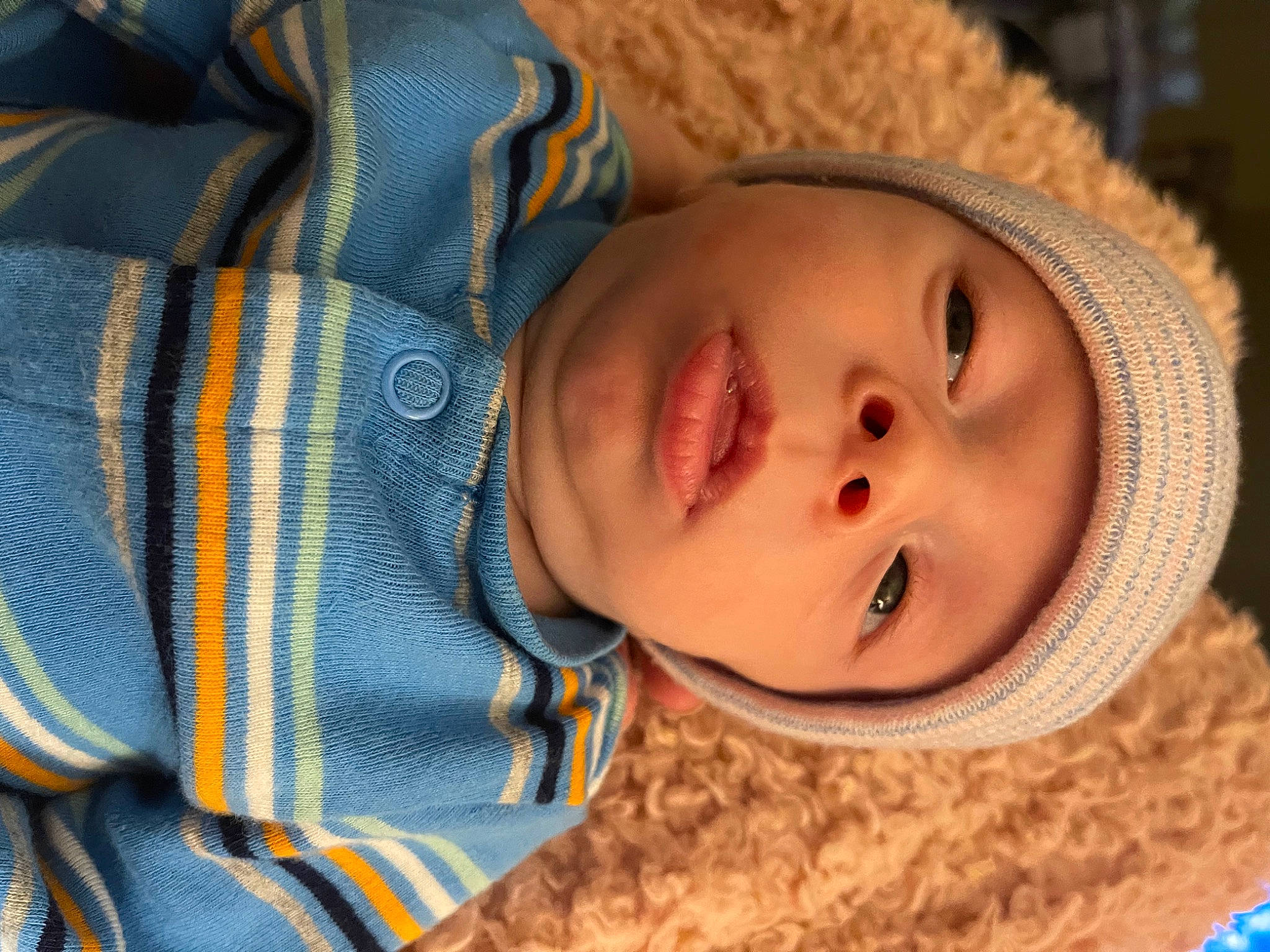 Corey is registered to the contest to win money with this photo: baby, baby_toddler_clothing, beauty, cheek, child, close_up, comfort, eye, eyelash, happy, headwear, iris, linens, lip, nose, outerwear, person, skin, sleeve, smile