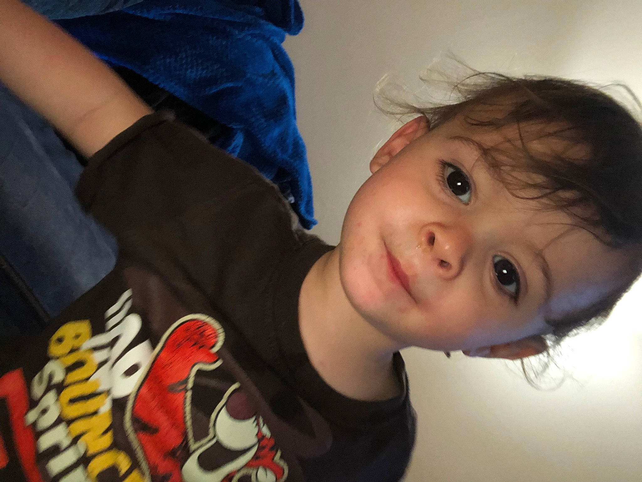 Brian is registered to the contest to win money with this photo: baby, baby_toddler_clothing, cheek, child, elbow, eye, eyelash, flash_photography, fun, gesture, happy, lip, mouth, nose, person, portrait_photography, sitting, sleeve, smile, t_shirt