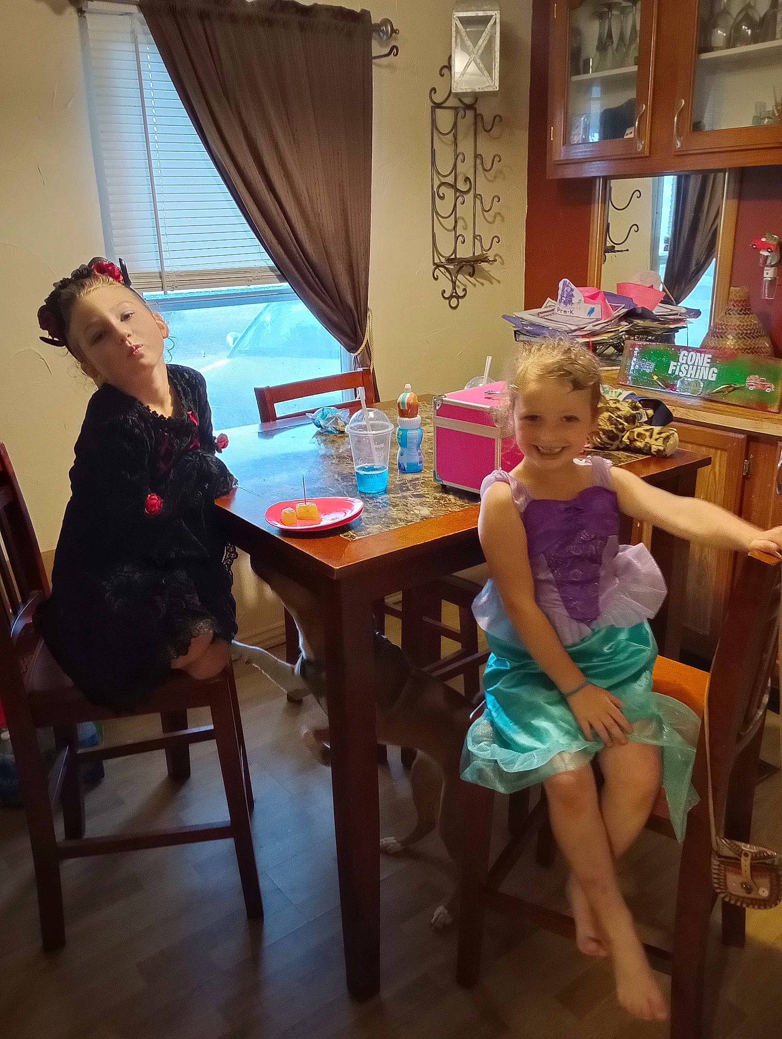 Evelynn joined the competition — help win amazing prizes! chair, curtain, desk, event, face, fashion, floor, flooring, fun, furniture, hardwood, joy, leisure, lighting, person, picture_frame, social_group, standing, table, tableware