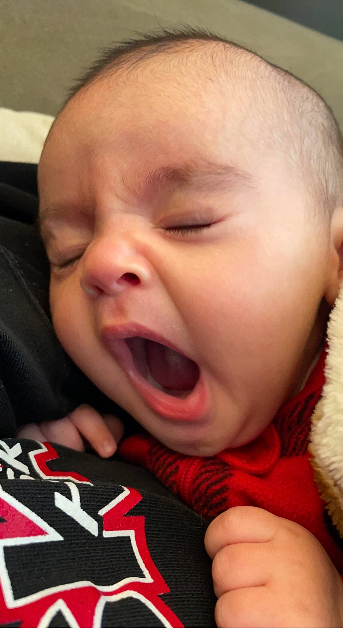 Kohen is registered to the contest to win money with this photo: baby, cheek, child, eye, eyebrow, eyelash, facial_expression, finger, gesture, happy, iris, lip, mouth, nose, person, red, skin, smile, toddler, tongue