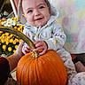 Grace is registered to the contest to win money with this photo: baby, child, infant, smiling, happy, portrait, pumpkin, autumn, fall, flowers, chrysanthemums, hooded_clothing, onesie, seated, indoor, colorful, close_up, garden, seasonal, family_photo