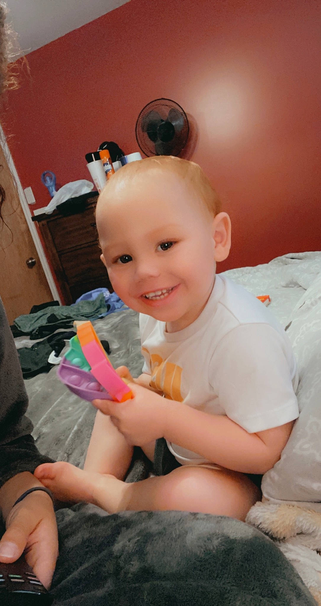 Cannon is registered to the contest to win money with this photo: baby, baby_toddler_clothing, cheek, dress, finger, fun, hand, happy, head, human_body, iris, joy, knee, leg, person, pink, skin, smile, sock, thigh