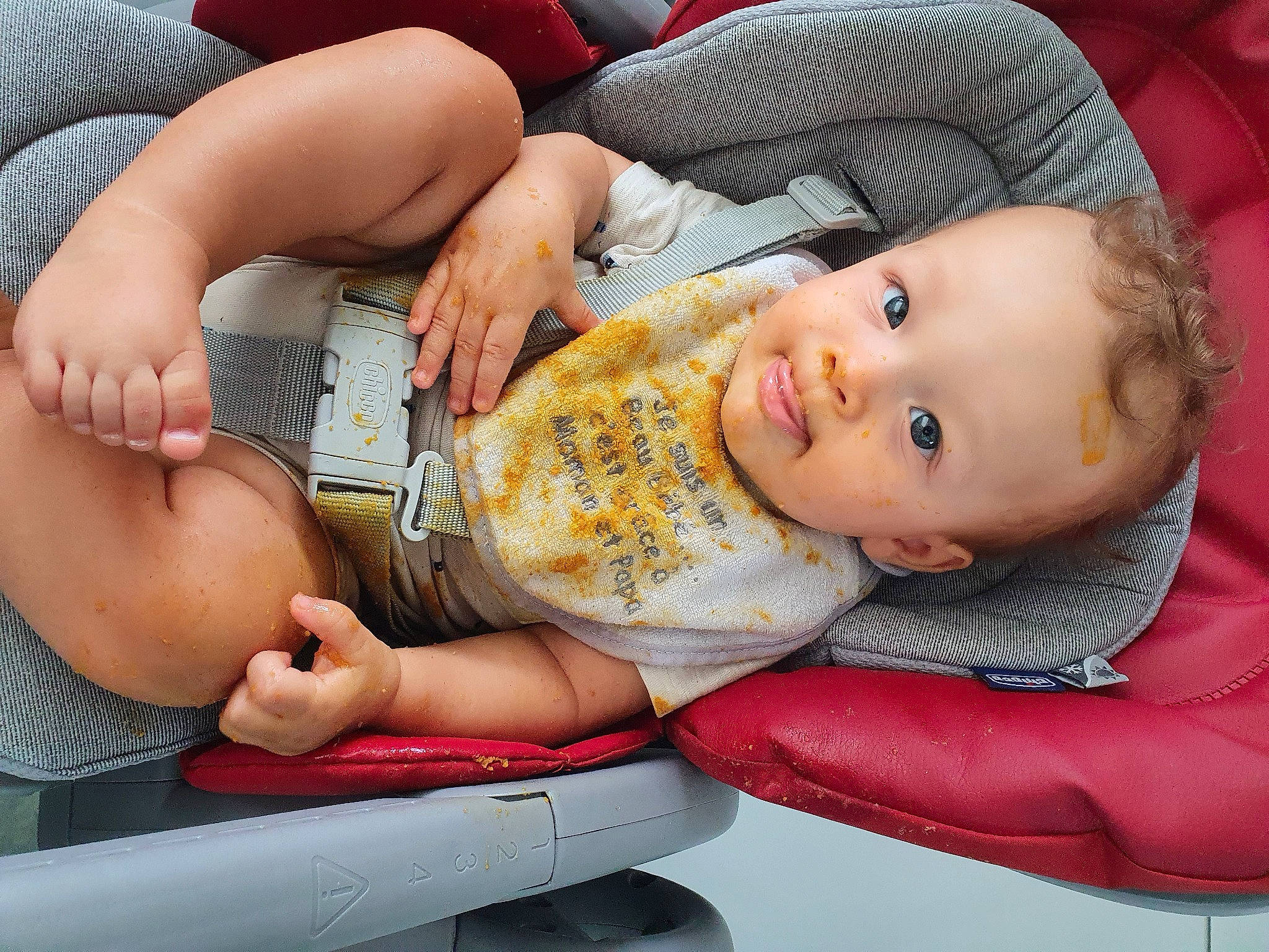 Nolan participe au concours pour gagner de l'argent avec cette photo : baby, baby_toddler_clothing, cheek, chest, child, comfort, elbow, facial_expression, fun, happy, hat, human_leg, knee, lap, mouth, person, sitting, skin, smile, thigh