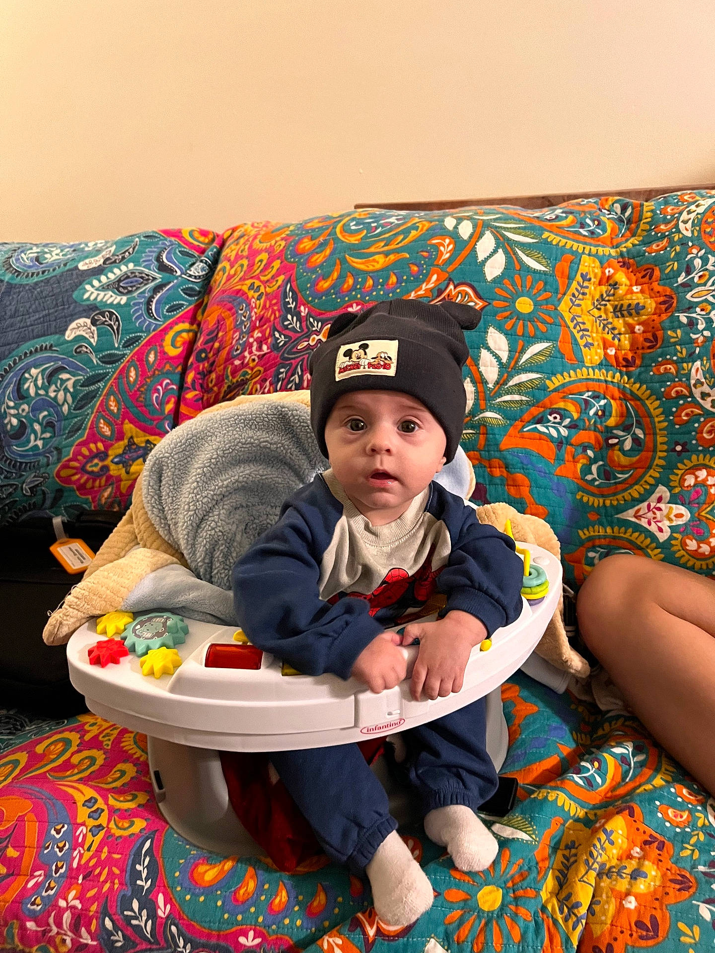 Daniel is registered to the contest to win money with this photo: architecture, baby, building, cap, clothing, couch, cushion, face, furniture, hat, head, homedecor, indoors, interiordesign, livingroom, person, photography, portrait, room, sitting