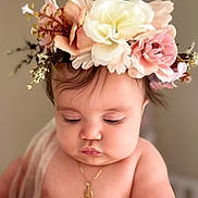 Ashley joined the competition — help win amazing prizes! baby, flower_crown, necklace, portrait, cute, infant, soft_light, skin, face, chubby, closeup, adorable, child, young, headwear, natural_light, expression, peaceful, indoors, person