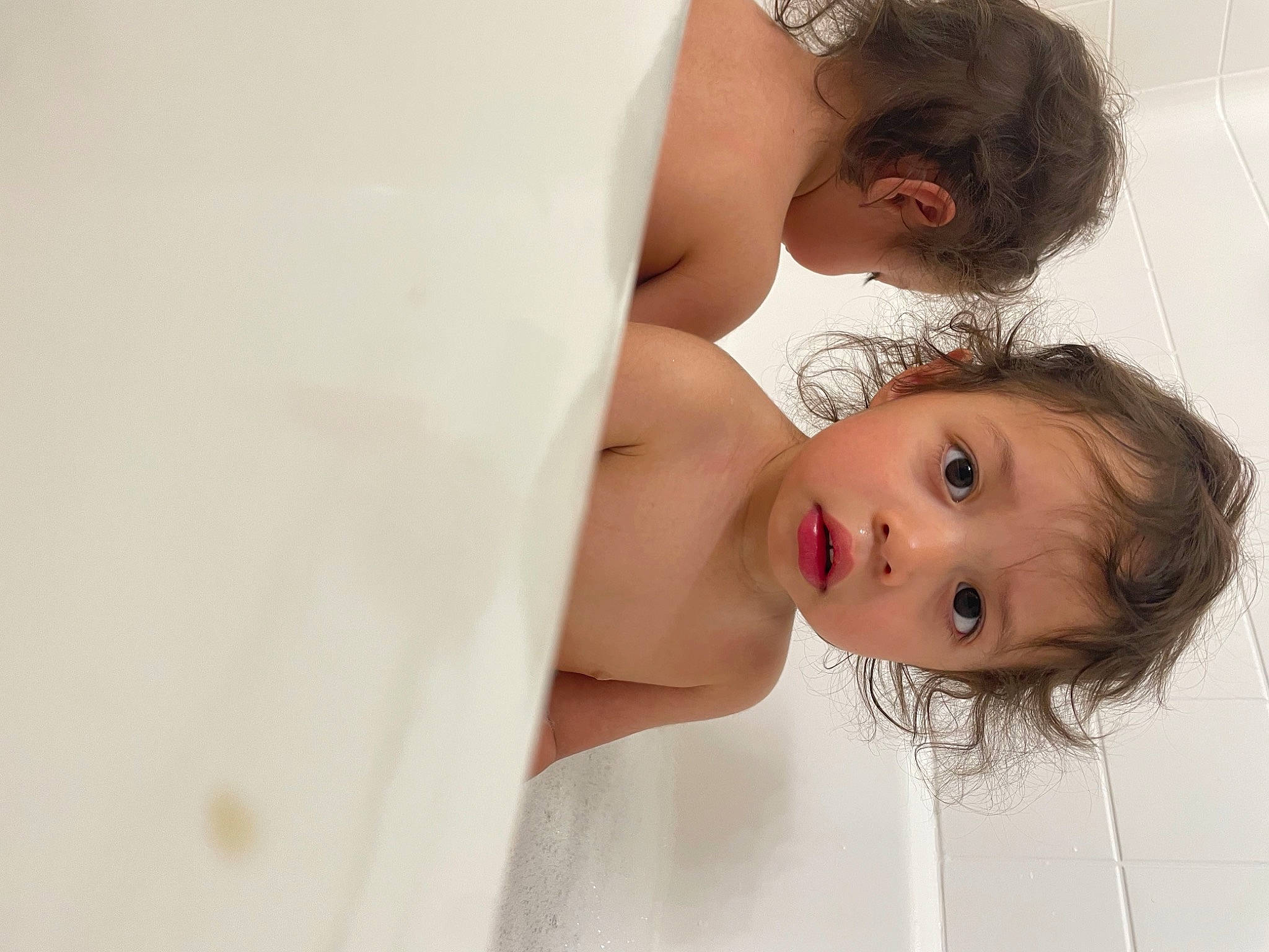 Ryder is registered to the contest to win money with this photo: arm, black_hair, cheek, chest, chin, comfort, eyebrow, eyelash, flash_photography, gesture, happy, human_body, iris, lip, long_hair, mouth, neck, nose, person, shoulder